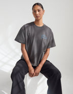 Dark Coastal Graphic Tee — "Follow the Moonlight" Surfer Silhouette T-Shirt