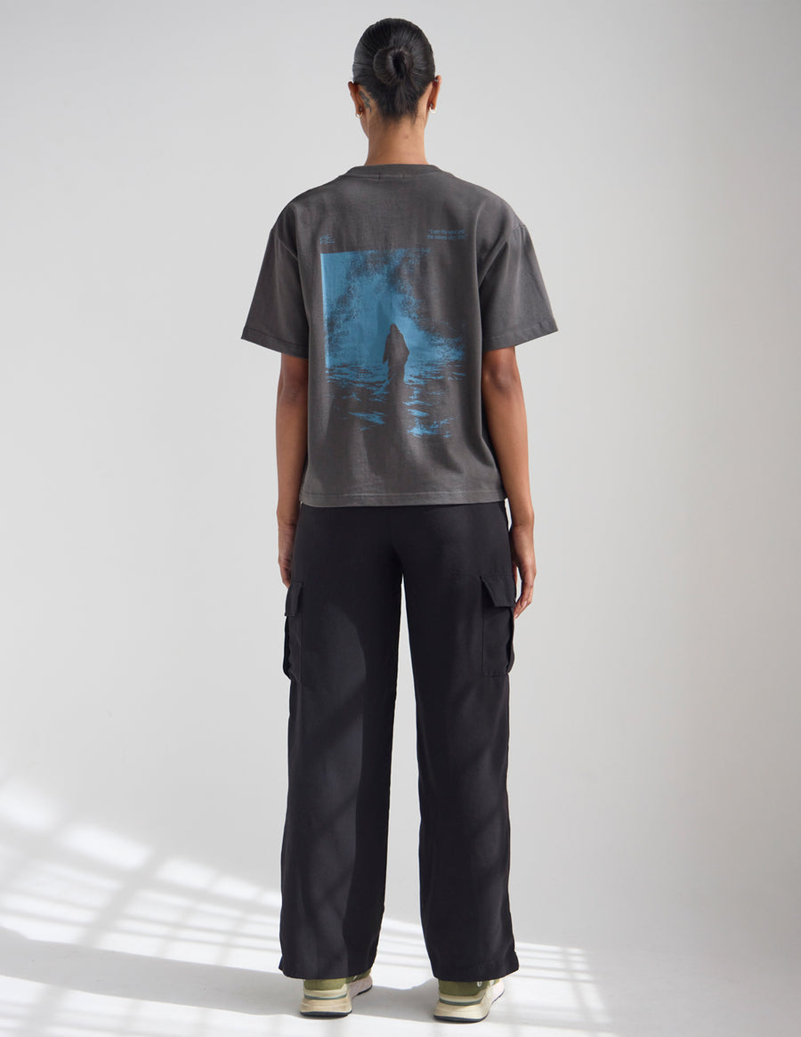 Dark Coastal Graphic Tee — "Follow the Moonlight" Surfer Silhouette T-Shirt