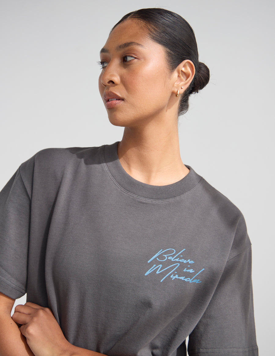 Dark Coastal Graphic Tee — "Follow the Moonlight" Surfer Silhouette T-Shirt