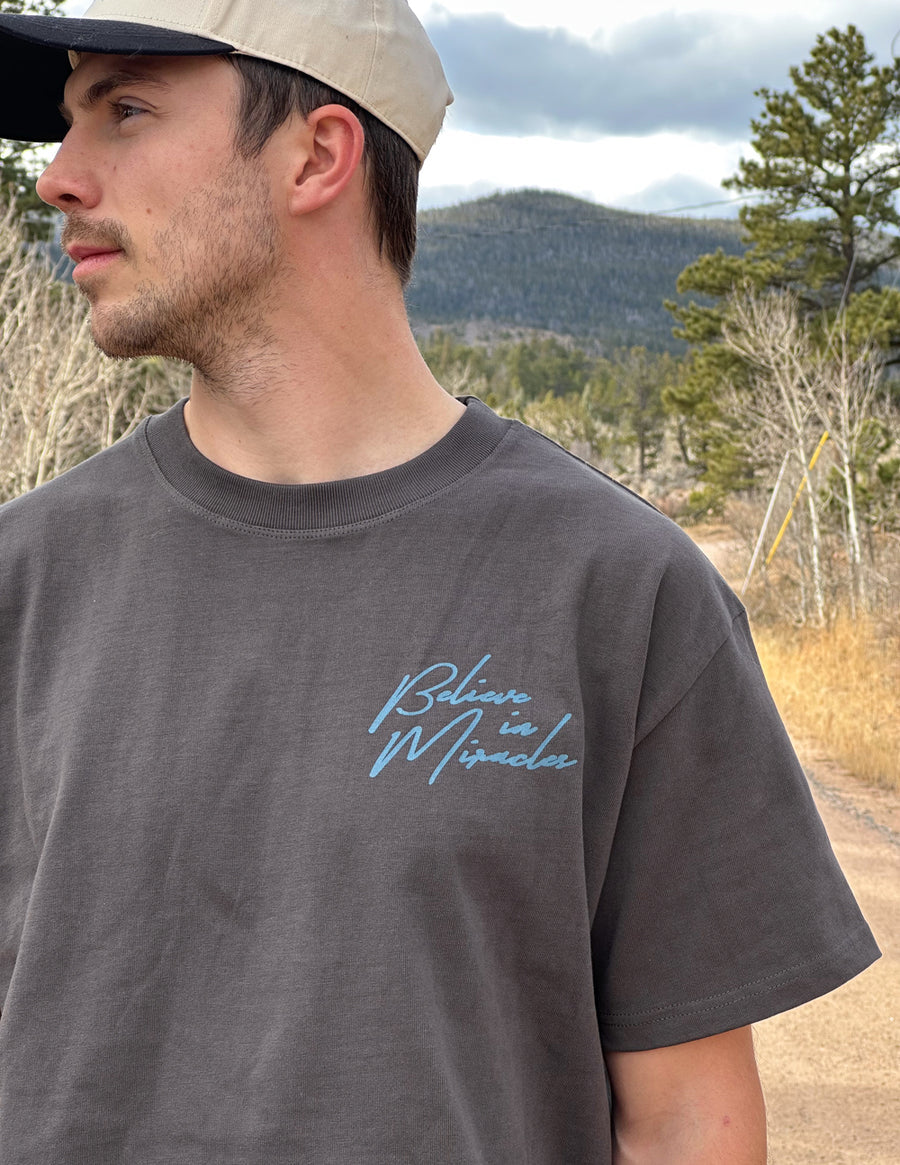 Dark Coastal Graphic Tee — "Follow the Moonlight" Surfer Silhouette T-Shirt